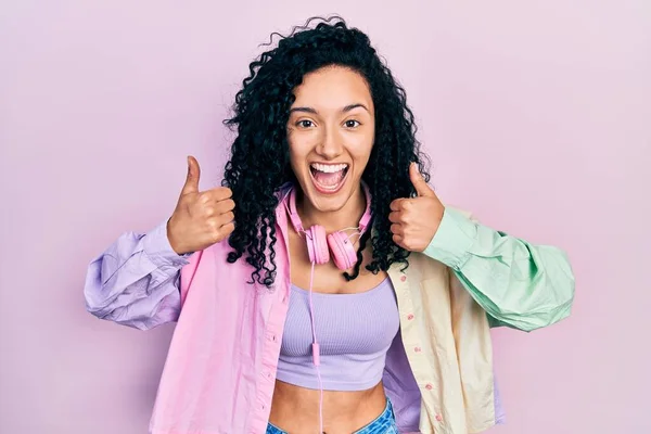 Young Hispanic Woman Curly Hair Doing Thumbs Positive Gesture Smiling — Fotografia de Stock