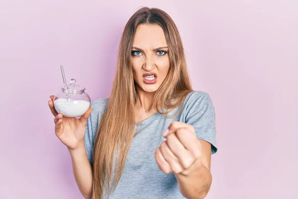 Young Blonde Girl Holding Bowl Sugar Annoyed Frustrated Shouting Anger — 스톡 사진