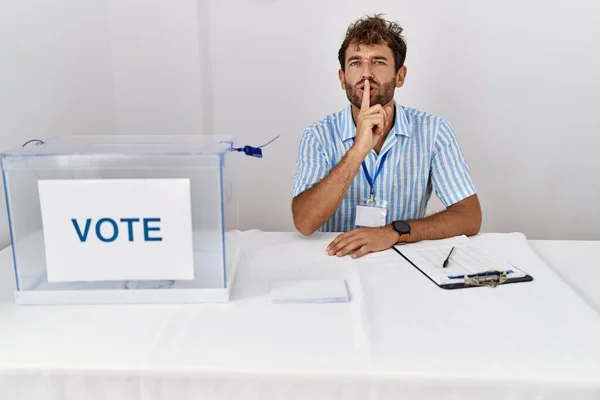 Young Handsome Man Political Election Sitting Ballot Asking Quiet Finger — Foto de Stock
