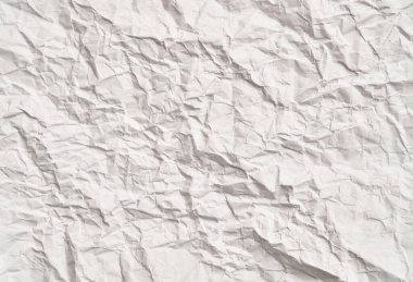 Kırışıklıkları olan beyaz buruşuk kağıt dokusu. Hasarlı ve yırtık çarşaf