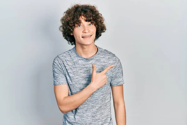 Handsome Young Man Wearing Casual Grey Shirt Smiling Cheerful Pointing — Stockfoto