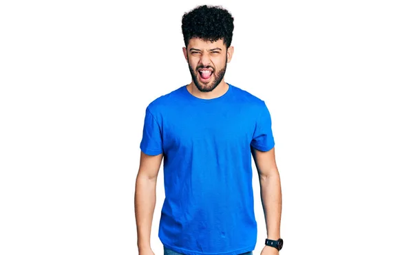 Young Arab Man Beard Wearing Casual Blue Shirt Sticking Tongue — Stockfoto