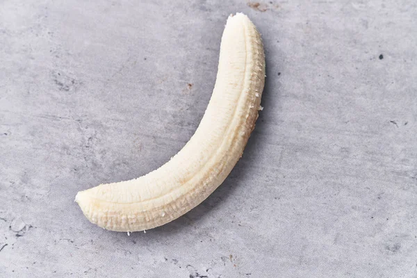 Peeled Banana Concrete Surface — Stock Photo, Image