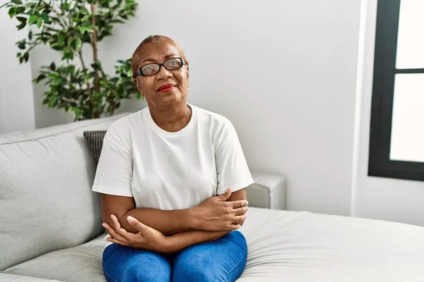 Mature Hispanic Woman Sitting Sofa Home Skeptic Nervous Disapproving Expression — 图库照片