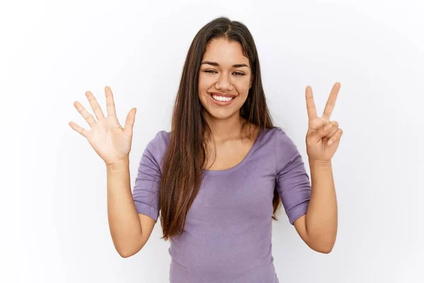 Young Brunette Woman Standing Isolated Background Showing Pointing Fingers Number — Stock Photo, Image