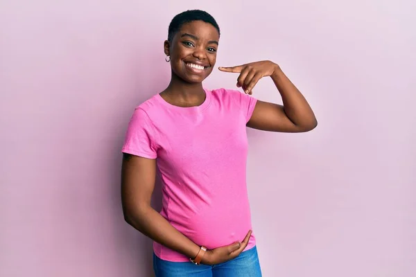 Young African American Woman Expecting Baby Touching Pregnant Belly Smiling — Fotografia de Stock