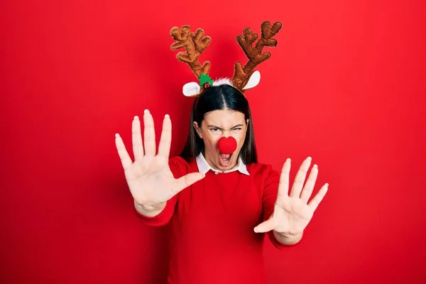 Young Hispanic Woman Wearing Deer Christmas Hat Red Nose Doing — Stock Photo, Image