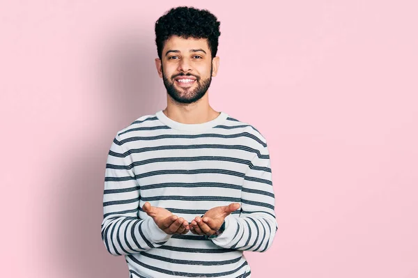 Young Arab Man Beard Wearing Casual Striped Sweater Smiling Hands — Stock fotografie