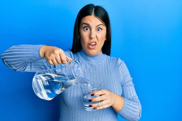 Beautiful Brunette Woman Pouring Water Glass Clueless Confused Expression Doubt — 스톡 사진