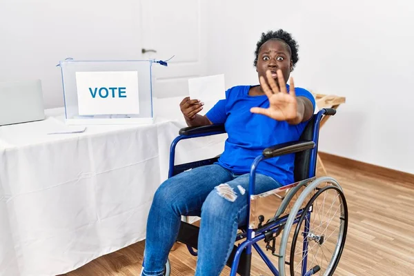 Young African Woman Sitting Wheelchair Voting Putting Envelop Ballot Box —  Fotos de Stock