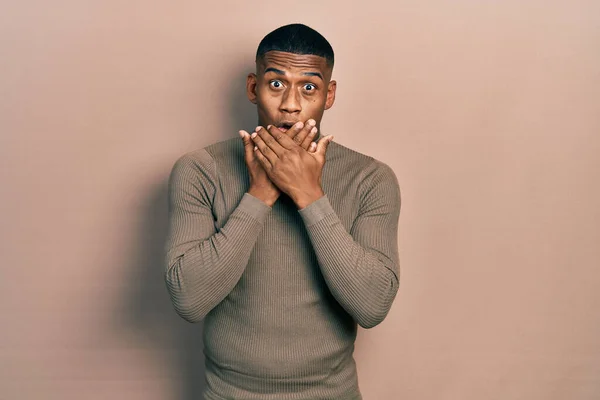 Young Black Man Wearing Casual Turtleneck Sweater Shocked Covering Mouth — Fotografia de Stock