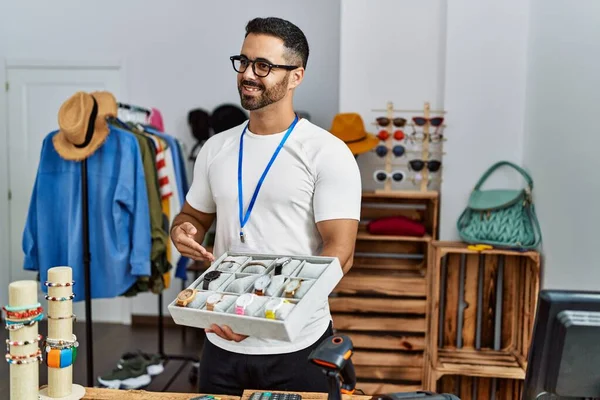Young Hispanic Man Shopkeeper Showing Watch Working Clothing Store — Fotografia de Stock