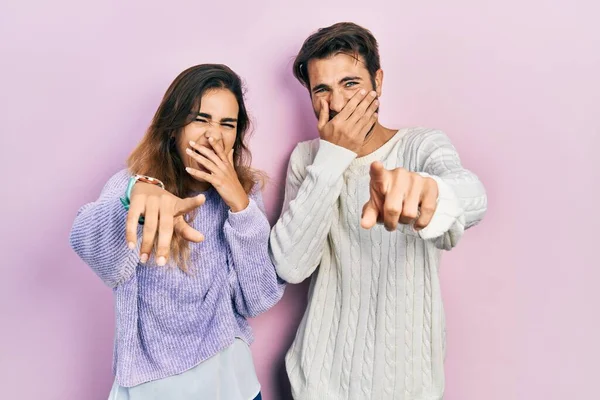 Young Hispanic Couple Wearing Casual Clothes Laughing You Pointing Finger — ストック写真