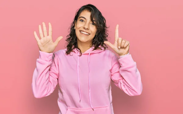 Young Hispanic Woman Wearing Casual Sweatshirt Showing Pointing Fingers Number — Stock fotografie
