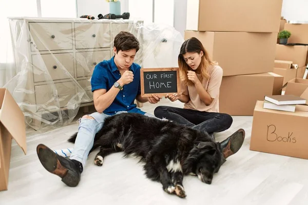 Young Caucasian Couple Dog Holding Our First Home Blackboard New — Fotografia de Stock