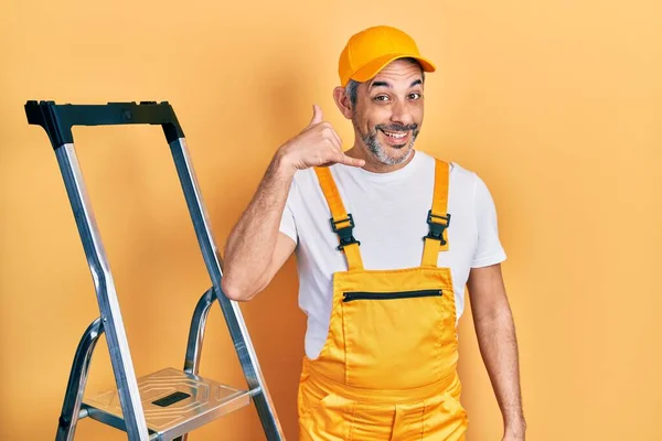 Handsome Middle Age Man Grey Hair Holding Ladder Smiling Doing — Stockfoto