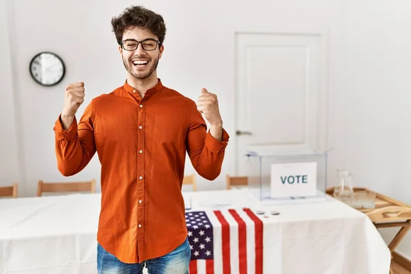 Hispanic Man Standing Election Room Excited Success Arms Raised Eyes — Stockfoto