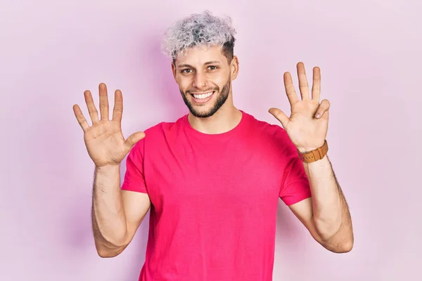 Young Hispanic Man Modern Dyed Hair Wearing Casual Pink Shirt — Stockfoto