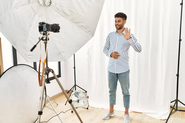 Arab Young Man Posing Model Photography Studio Waiving Saying Hello — Stockfoto