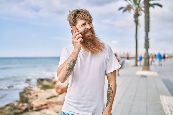 Young Redhead Man Smiling Happy Using Smarphone Beach — Stock Photo, Image