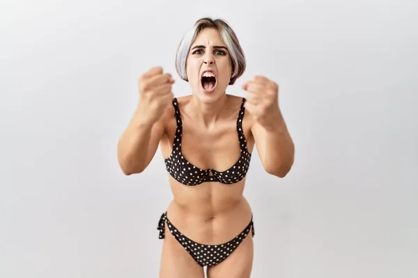 Young Beautiful Woman Wearing Swimsuit Isolated Background Angry Mad Raising — Stockfoto