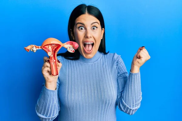 Beautiful Brunette Woman Holding Anatomical Model Female Genital Organ Screaming — Foto Stock