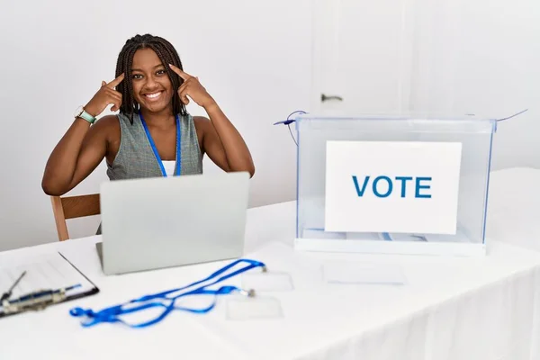 Young African American Woman Working Political Election Sitting Ballot Smiling — стокове фото