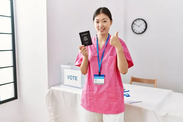 Young Asian Nurse Woman Political Campaign Election Holding Usa Passport — стоковое фото