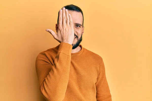 Young Man Beard Wearing Casual Winter Sweater Covering One Eye — Stockfoto