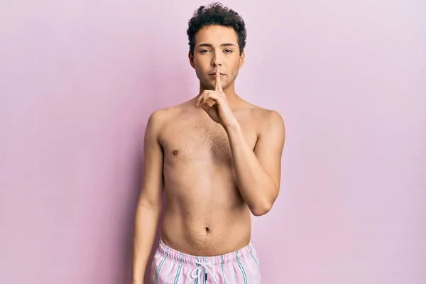Young Handsome Man Wearing Swimwear Shirtless Asking Quiet Finger Lips — Stock Photo, Image