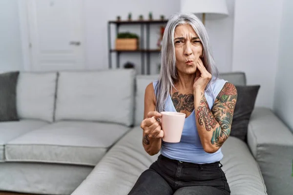 Middle Age Grey Haired Woman Drinking Coffee Sitting Sofa Home — Photo