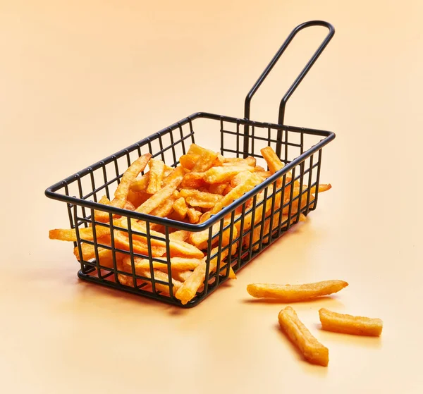 Steel Basket French Fried Potatoes Yellow Background — Fotografia de Stock