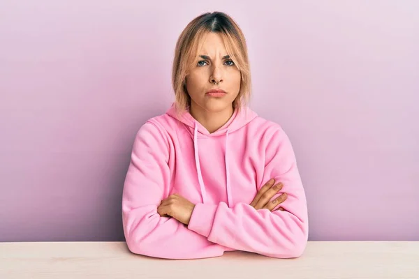 Young Caucasian Woman Wearing Casual Clothes Sitting Table Skeptic Nervous — Stock Photo, Image