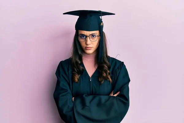 Young Hispanic Woman Wearing Graduation Cap Ceremony Robe Skeptic Nervous — ストック写真