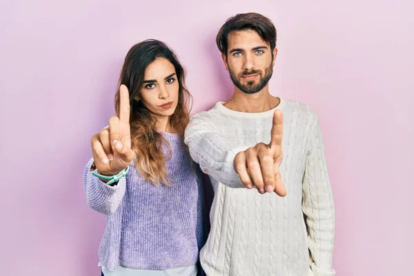 Young Hispanic Couple Wearing Casual Clothes Pointing Finger Angry Expression — Stockfoto