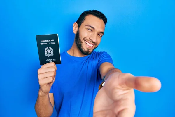 Hispanic Man Beard Holding Italy Passport Smiling Cheerful Offering Palm — Stock fotografie