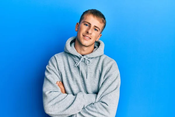 Young Caucasian Man Wearing Casual Sweatshirt Happy Face Smiling Crossed — Stockfoto