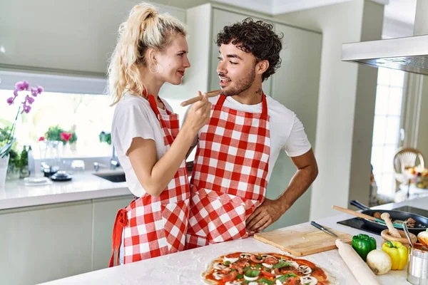 Young Couple Smiling Happy Tasty Meal Kitchen — Stock Photo, Image
