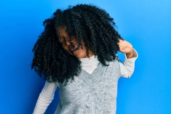 African American Woman Afro Hair Wearing Casual Winter Sweater Stretching — стоковое фото