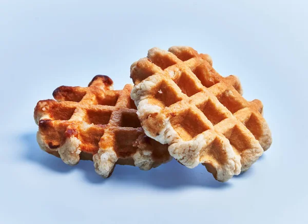Two Delicious Waffles Blue Background — Stockfoto