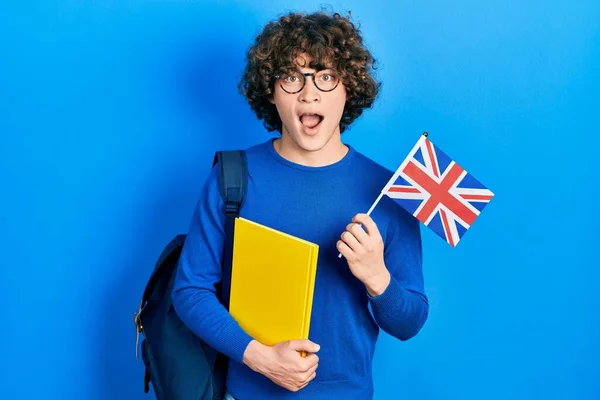 Handsome Young Man Exchange Student Holding Flag Celebrating Crazy Amazed — 스톡 사진