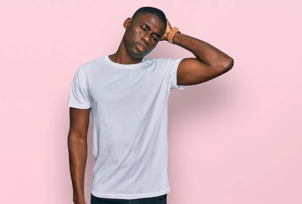 Young African American Man Wearing Casual White Shirt Confuse Wondering — Fotografia de Stock