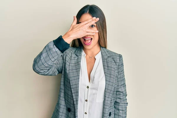 Young Hispanic Woman Wearing Business Clothes Peeking Shock Covering Face — Stock Photo, Image