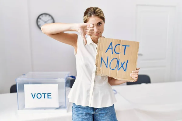 Young Blonde Woman Political Election Holding Act Now Banner Angry — Stock fotografie
