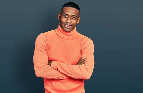 Young Black Man Wearing Orange Turtleneck Sweater Happy Face Smiling — Stok fotoğraf