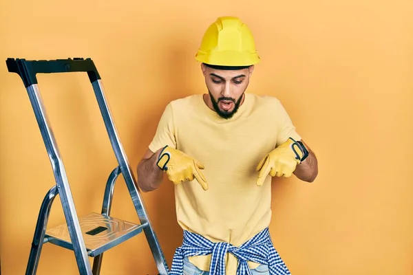Handsome Man Beard Construction Stairs Wearing Hardhat Pointing Fingers Showing — Fotografia de Stock