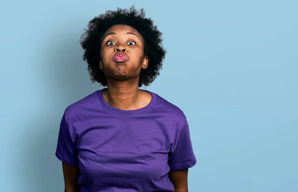 African American Woman Afro Hair Wearing Casual Purple Shirt Puffing — ストック写真
