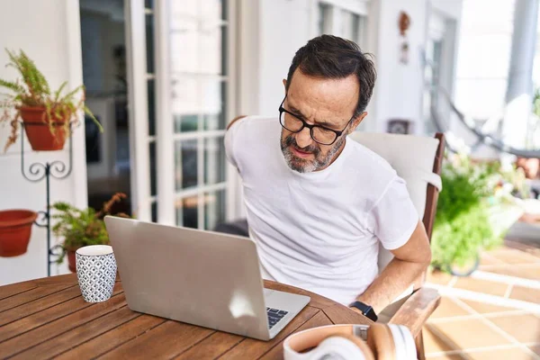 Middle Age Man Using Computer Laptop Home Suffering Backache Touching —  Fotos de Stock