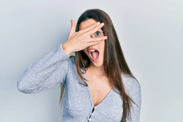Young Brunette Teenager Wearing Casual Sweater Glasses Peeking Shock Covering — Stock Fotó