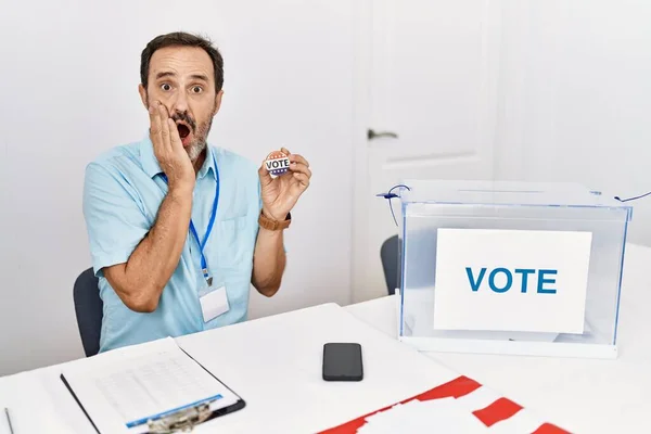 Middle Age Man Beard Sitting Ballot Holding Vote Badge Afraid — стоковое фото